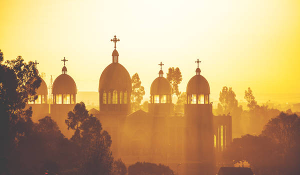 addis-ababa-ethiopian-orthodox-chruch-at-sunrise-cover