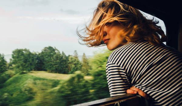 travel-inspiration-feeling-girl-in-train-window-cover