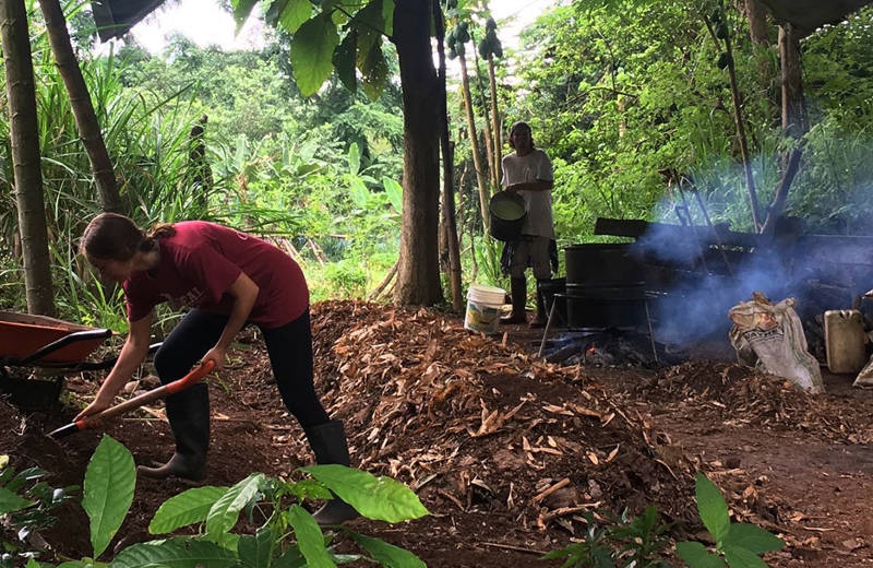 Two women working as volunteers on the organic farm on San Cristóbal, the Galapagos Islands