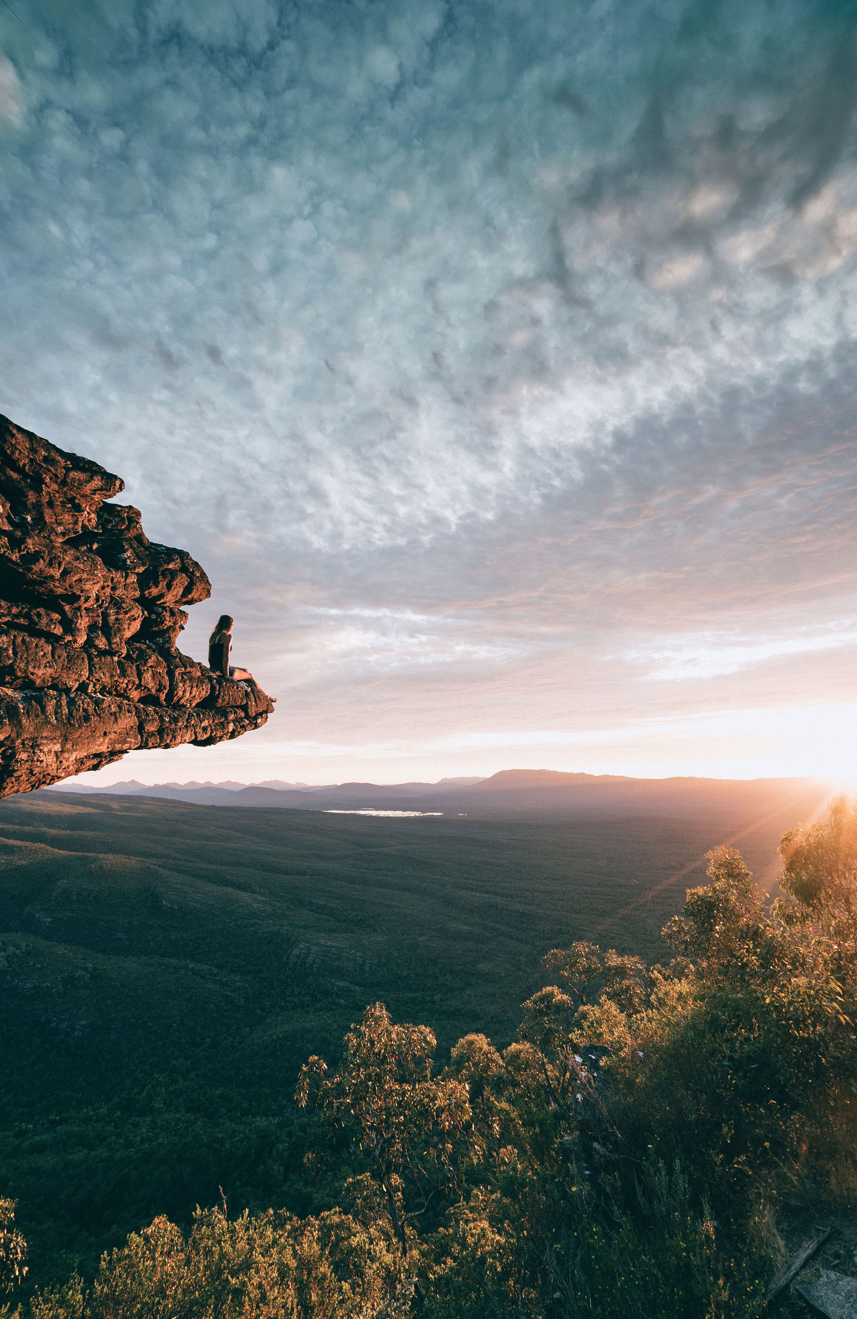 Girl Sitting On A Rock In Grampians National Park, Australia